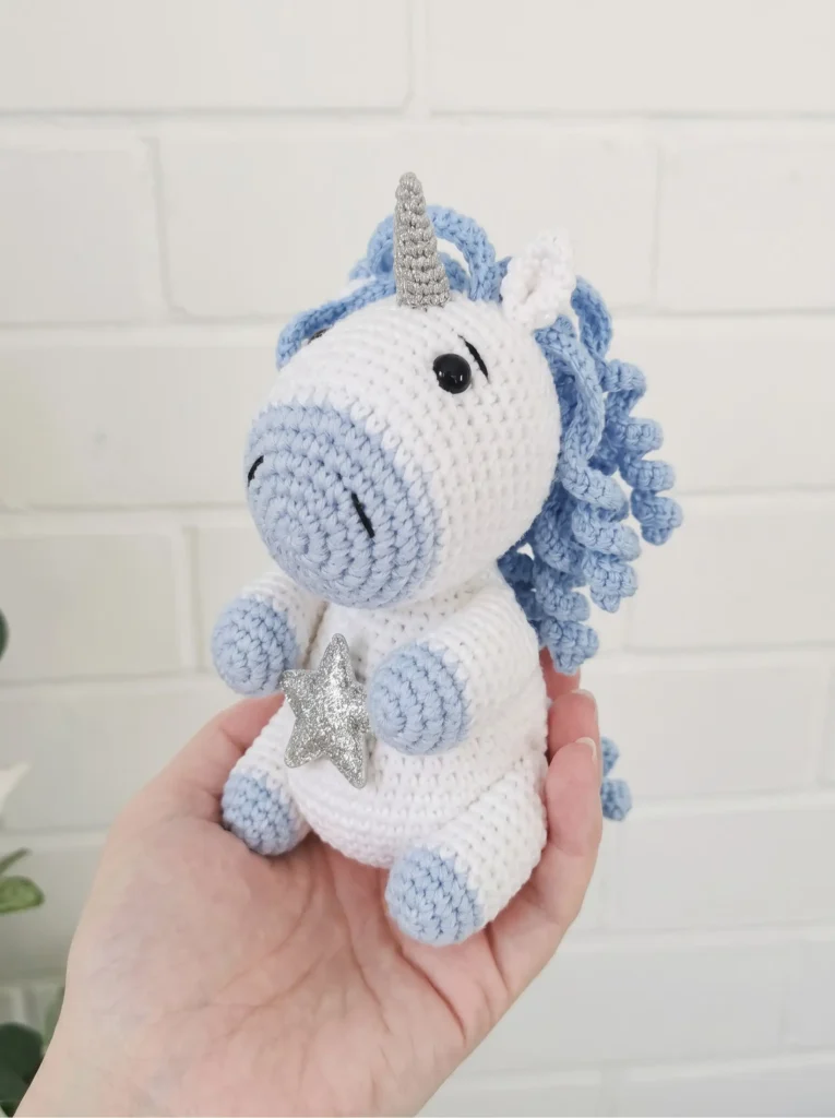 Free unicorn amigurumi pattern finished plush with mane, horn, and star detail