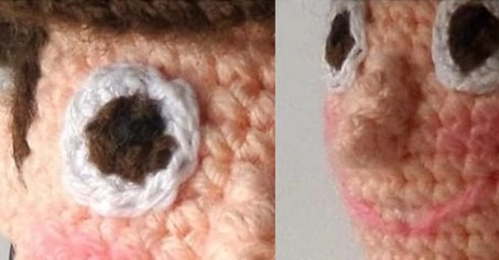Close-up side-by-side images of a crocheted Sheriff Woody face, highlighting the white eye with an embroidered brown pupil, a prominent crocheted nose, rosy cheeks, and a stitched pink smile.