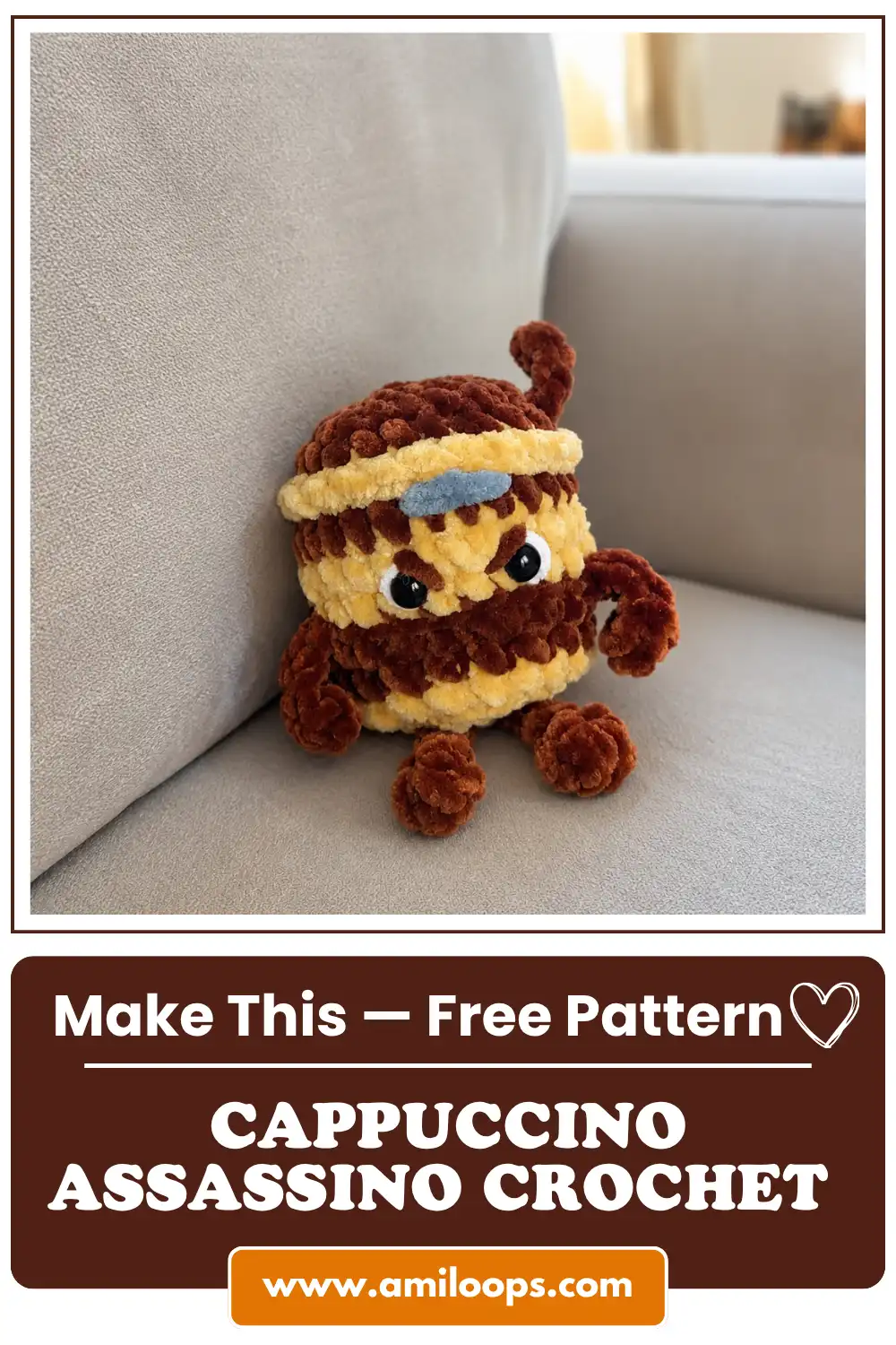 Close-up of the brown and beige velvet yarn amigurumi toy sitting on a grey sofa using this cappuccino assassino crochet pattern free.