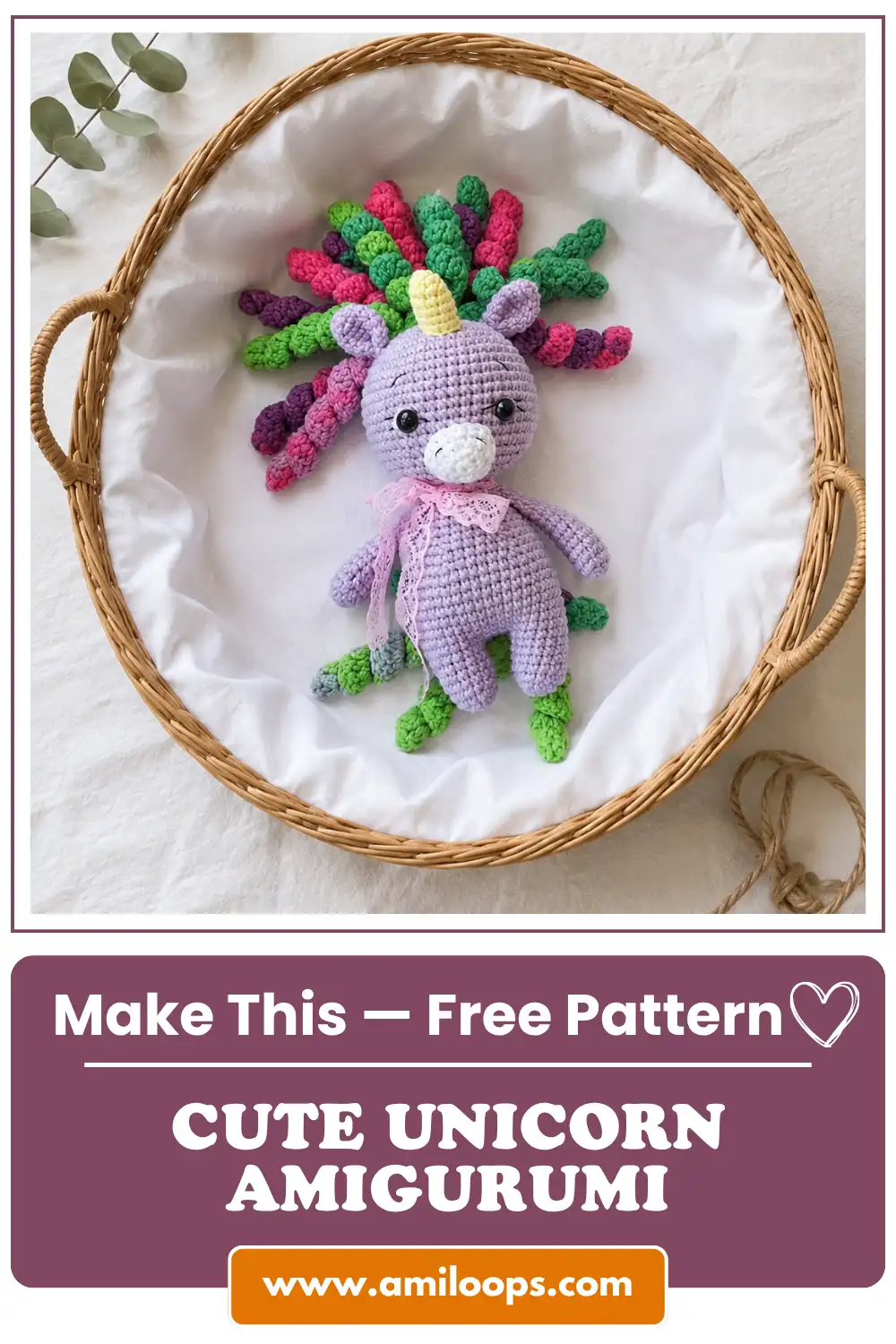 Cute unicorn amigurumi free pattern toy in purple yarn with a colorful mane, displayed in a woven basket.