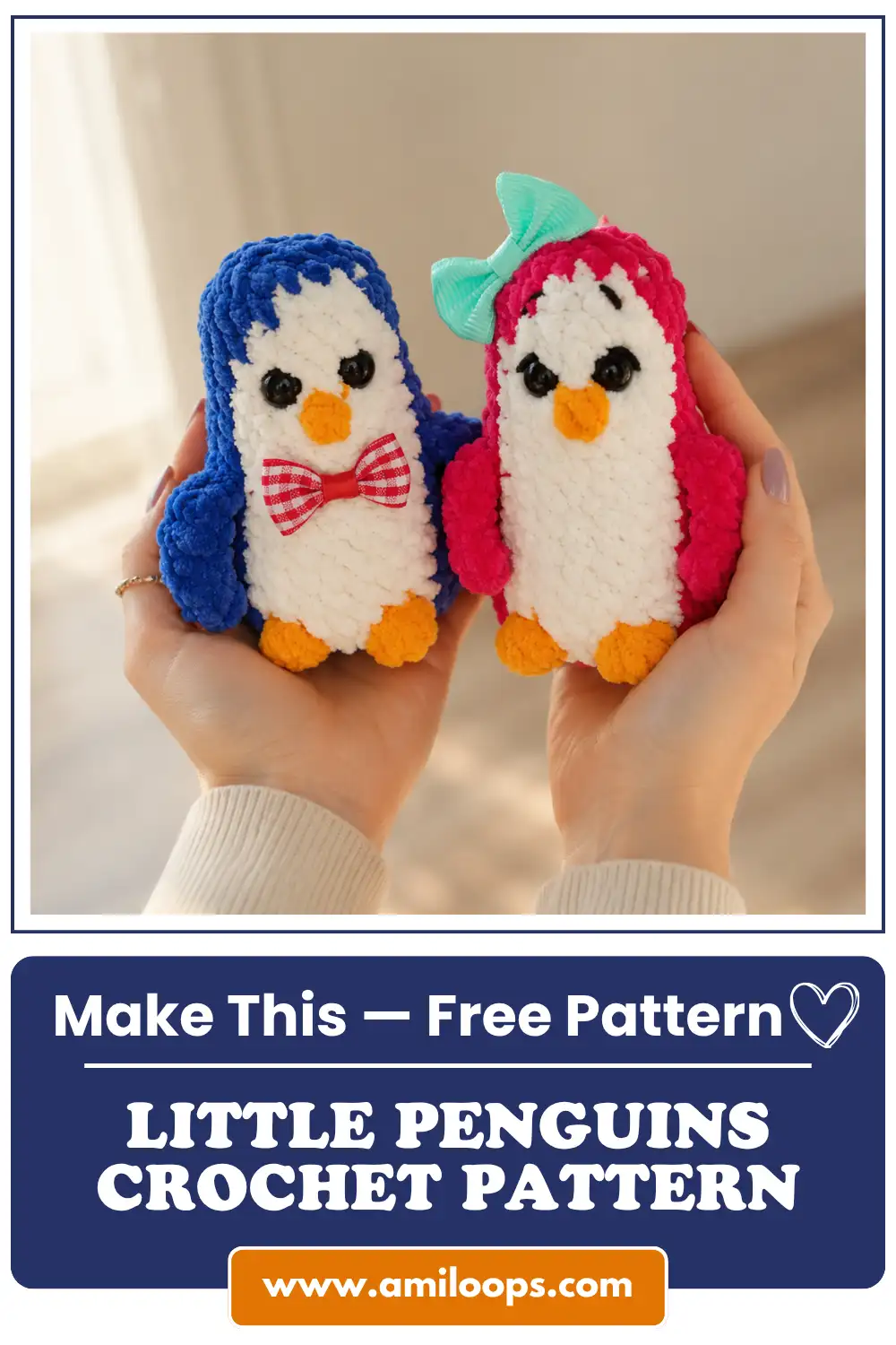 Close-up view of hands holding two crocheted amigurumi penguin toys, a blue and pink one.