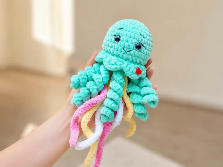 Collage of a mint crochet jellyfish amigurumi with pastel chains held in hand, on a bed, and on a couch.