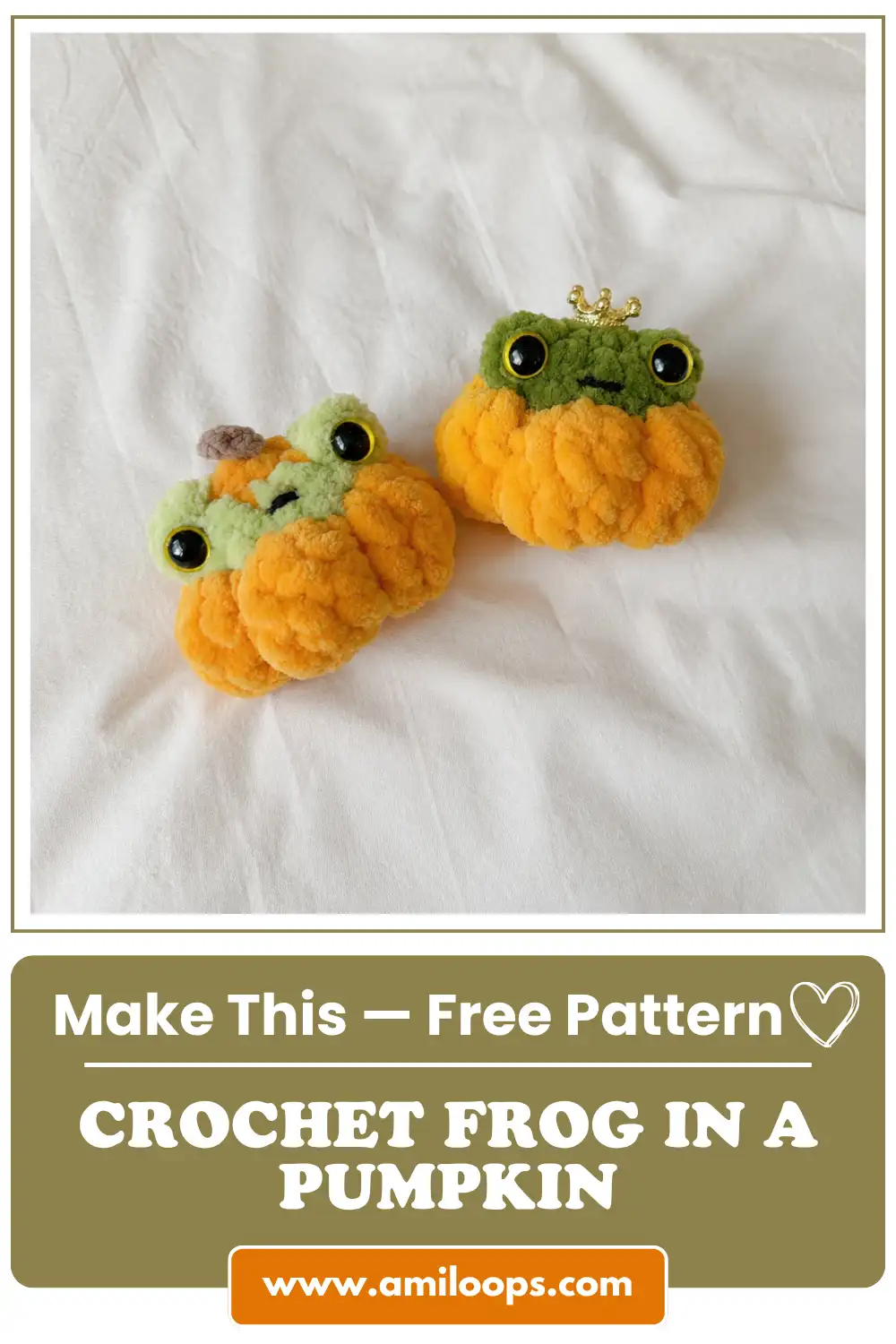 Close-up of two adorable amigurumi frogs inside chunky orange pumpkins, sitting on white textured fabric.