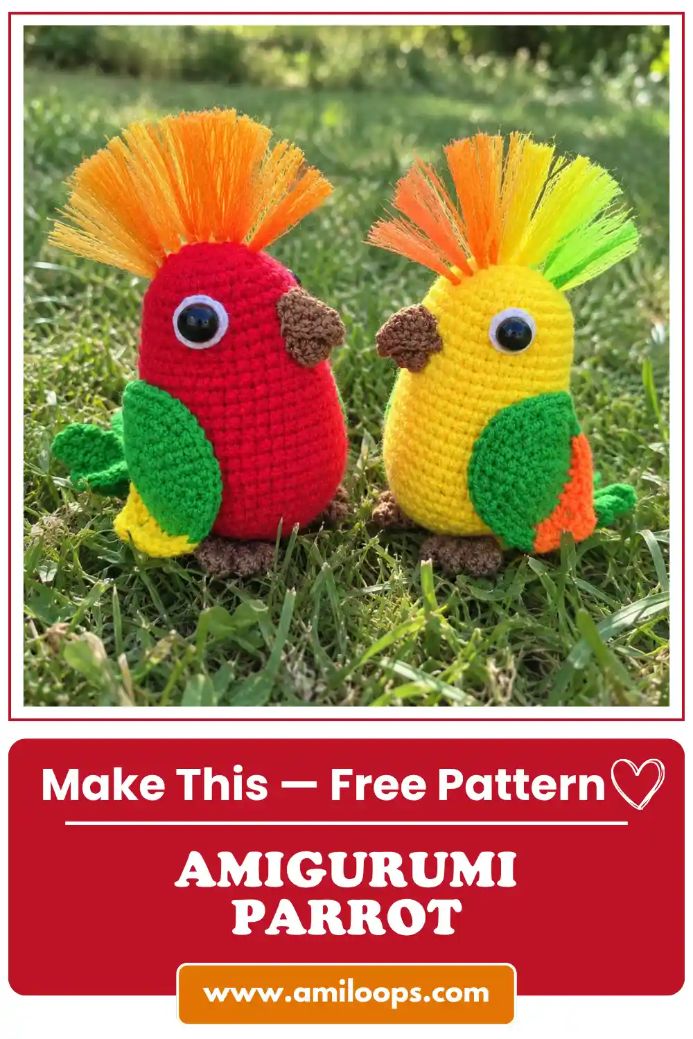 Colorful amigurumi parrot crochet toys in red and yellow yarn with green wings sitting outdoors in green grass.