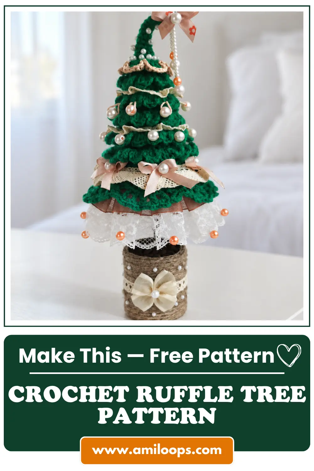 Hand holding a finished green crochet ruffle tree pattern adorned with lace and pearl beads against a snowy backdrop.
