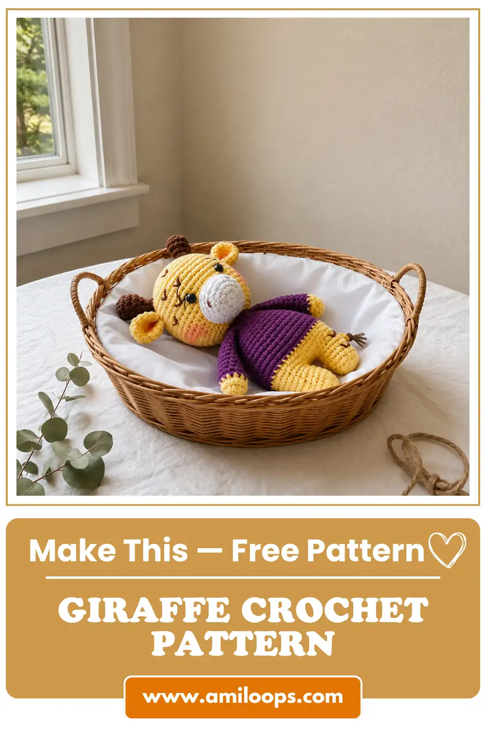 Yellow toy from our giraffe crochet pattern wearing a purple sweater, resting in a wicker basket on a white table.
