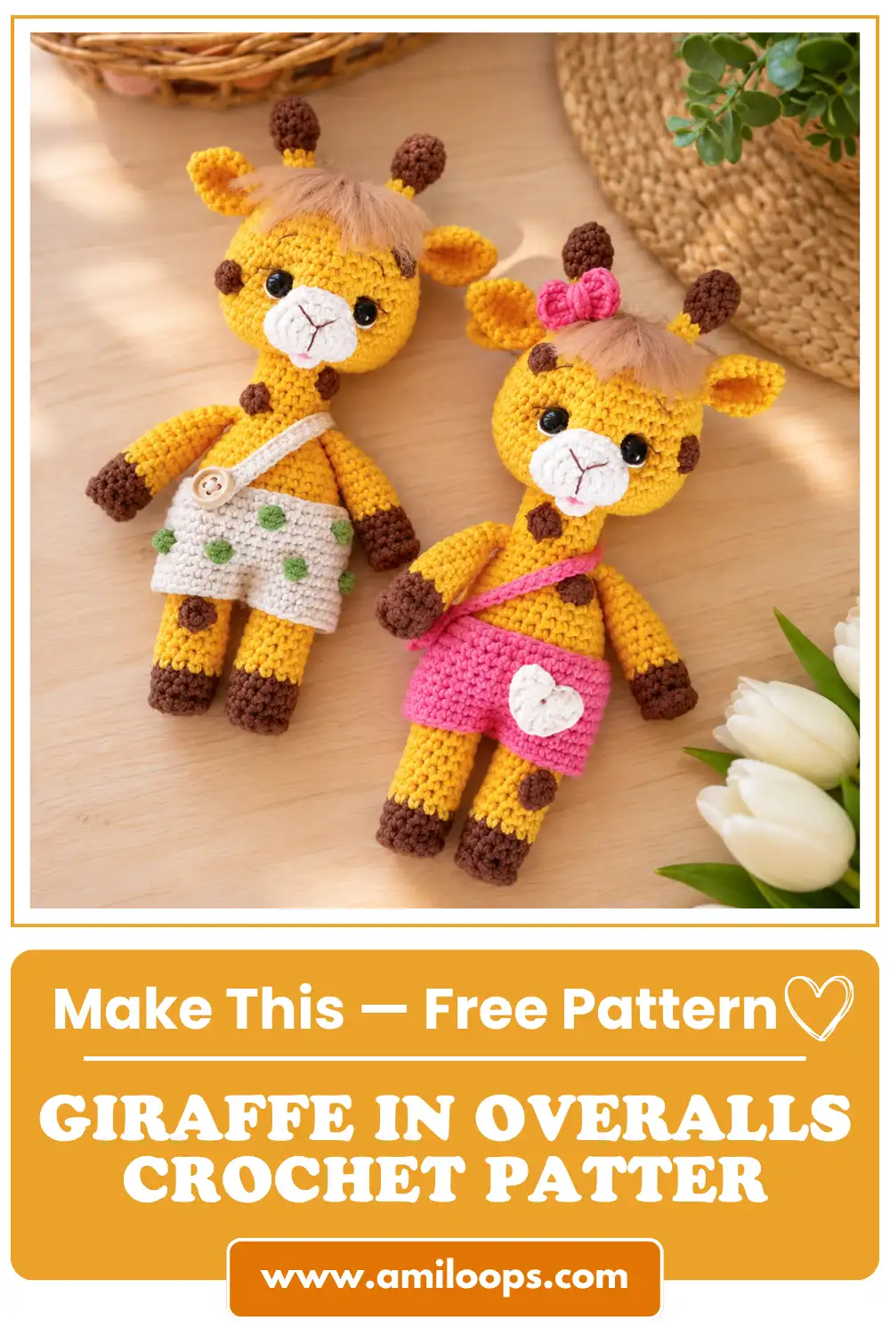 Two handmade amigurumi giraffes with overalls lie on a wooden table beside white tulips, yarn, and a small potted plant.